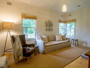 Merricks Cottage, Mornington Peninsula [Muskett Sisal rug with fold over edges and cushion pad underfelt]